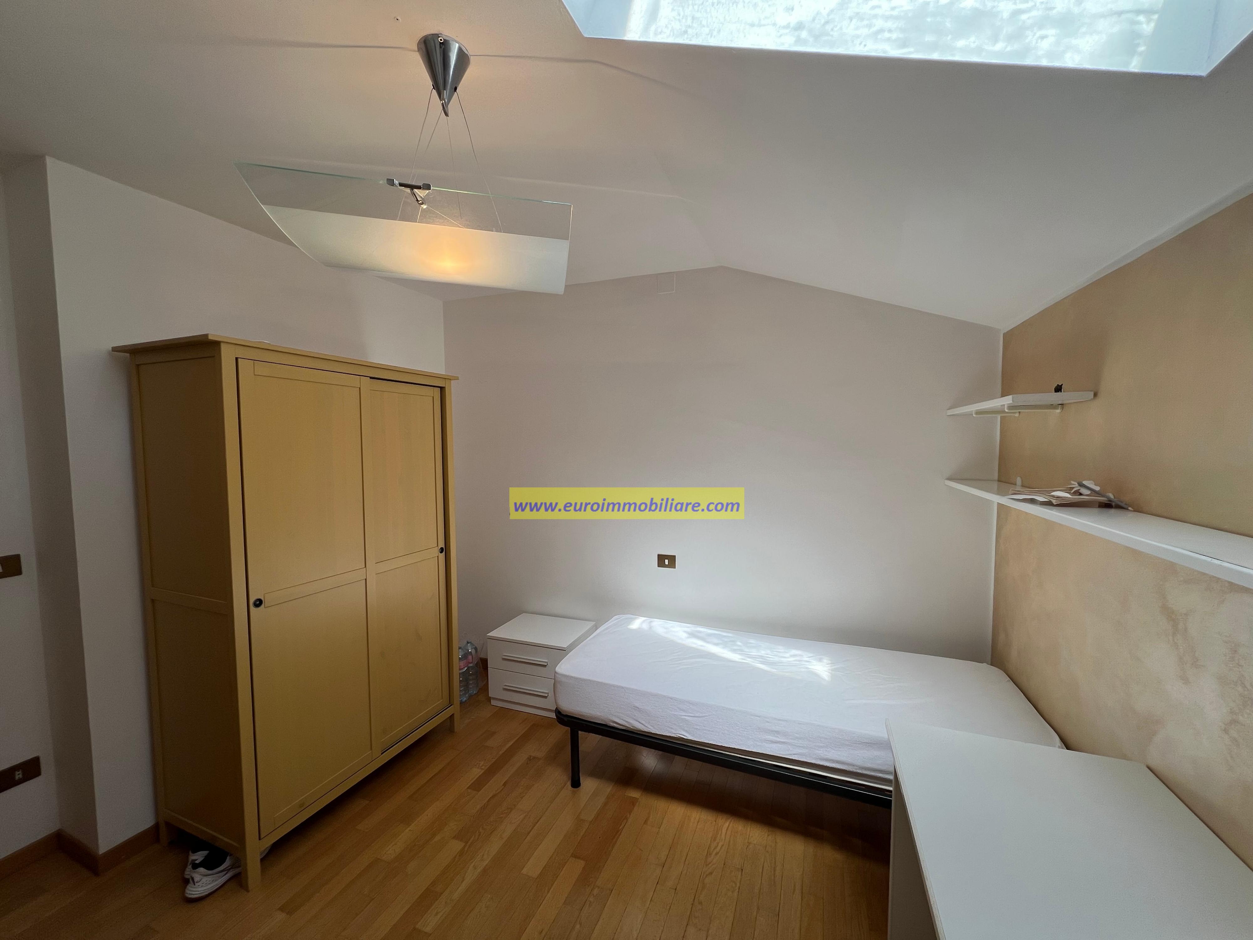 ELEGANTE ATTICO CON VISTA PANORAMICA