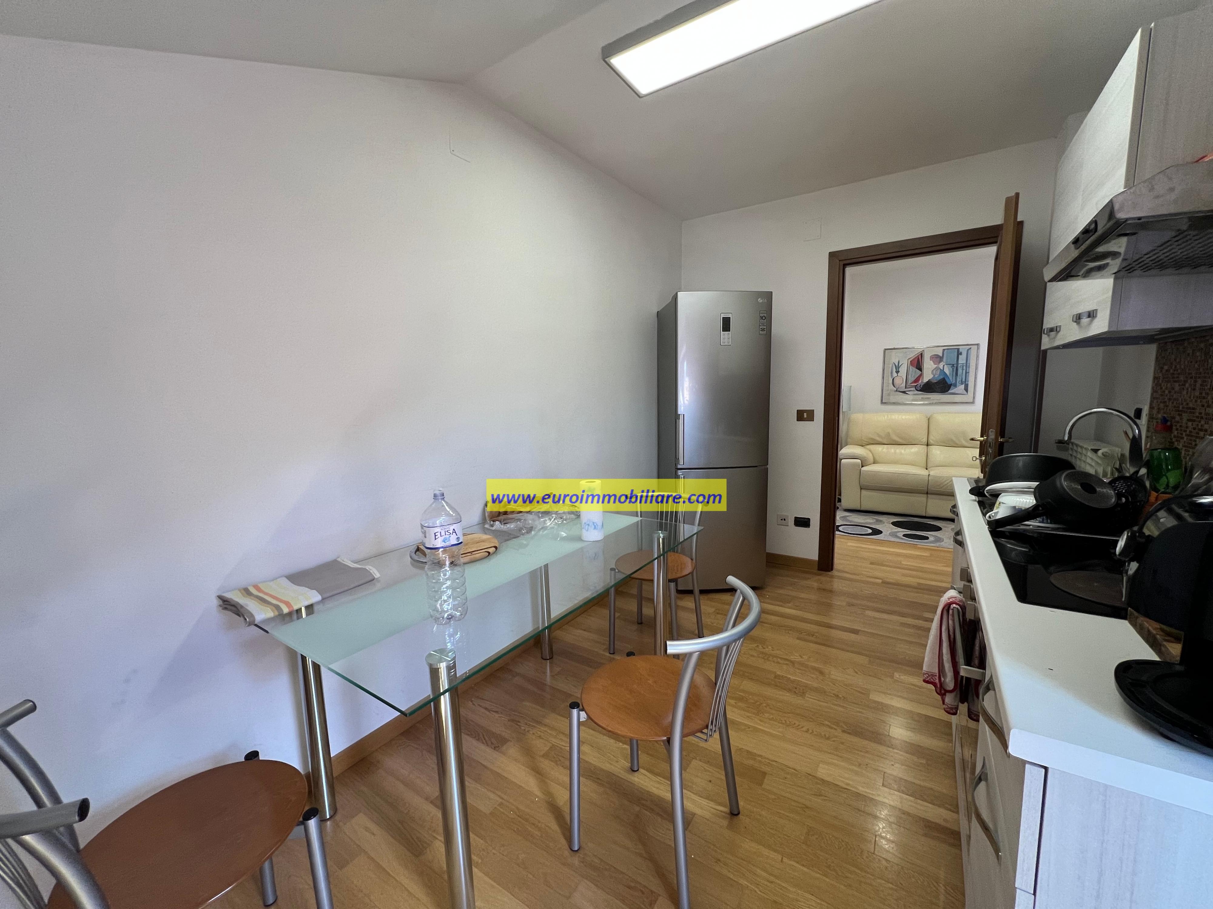 ELEGANTE ATTICO CON VISTA PANORAMICA