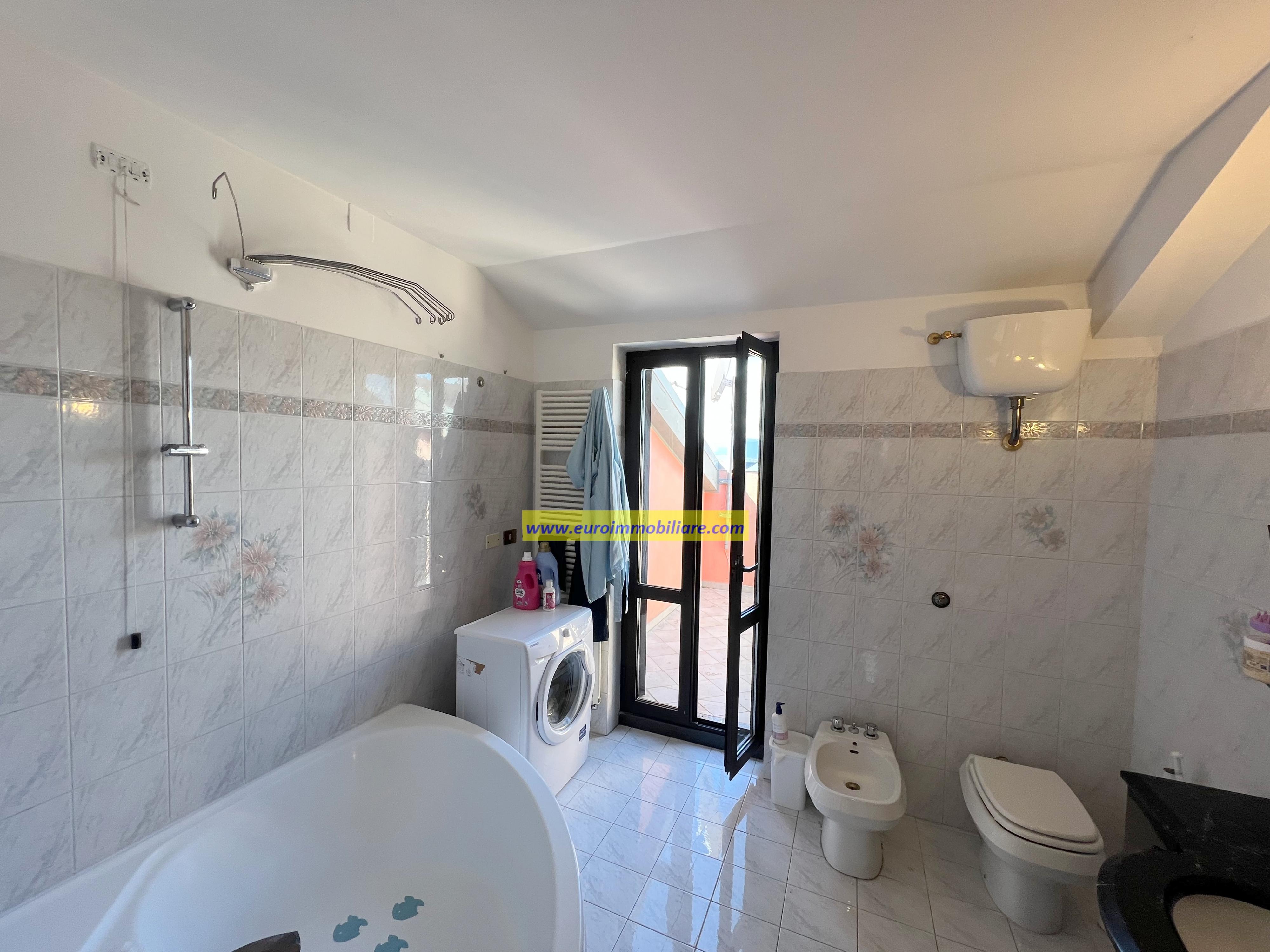 ELEGANTE ATTICO CON VISTA PANORAMICA